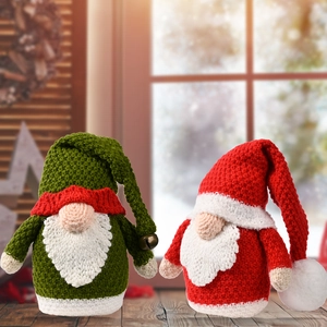 Knitted Christmas gnomes set with green and red festive outfits and golden bells
