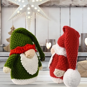 Knitted Christmas gnomes set with green and red hats on a cozy holiday background
