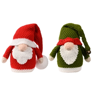 Christmas gnomes set with knitted red and green hats featuring white beards and small bells