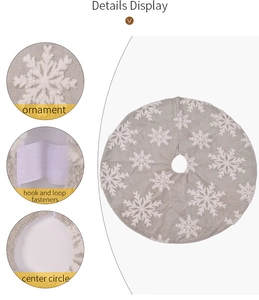 Detailed views of grey plush Christmas tree skirt with white 3D snowflake patterns