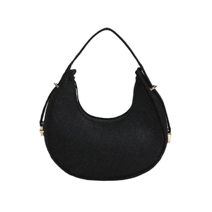 Minimalist black felt crescent hobo shoulder bag with textured fabric and gold hardware