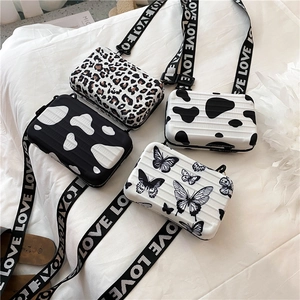 Mini suitcase crossbody bags with leopard and butterfly prints and wide LOVE straps