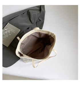 Top view of large tote bag with zipper closure and spacious interior compartment