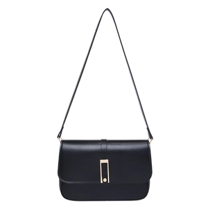 Minimalist black leather shoulder bag featuring a rectangular gold metal buckle detail