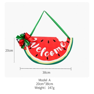 Detail of wooden watermelon welcome sign with bow showing 38x20cm dimensions