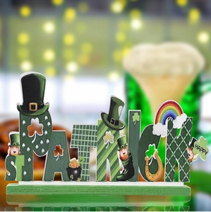 Macro detail of St. Patrick's Day wooden centerpiece with green shamrock and gnome elements
