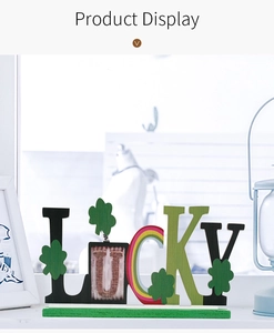 Close-up of wooden Lucky sign with shamrocks for St. Patrick's Day table decoration