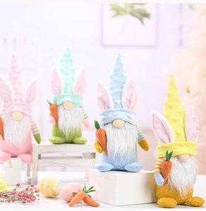 Detail of four colorful Easter gnomes with rabbit ears holding carrots on a white stand