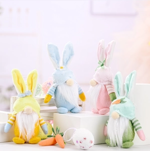 Set of four colorful Easter gnome plush dolls with bunny ears on geometric display stands
