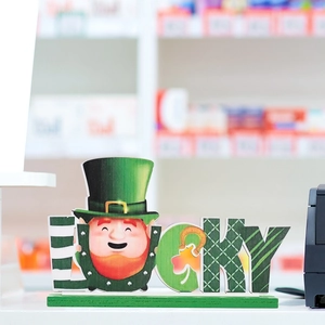 Wooden St. Patrick's Day Lucky sign with Leprechaun gnome and green clover desk decor