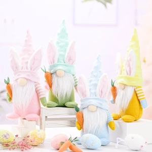 Set of four Easter gnomes with rabbit ears and carrots for festive home decoration
