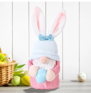 Close-up of Easter gnome with pink bunny ears and a blue polka dot egg ornament