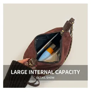 Detailed interior view of brown suede tote bag showing large capacity for essentials