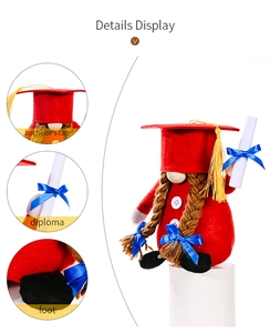 Detail view of red graduation gnome with bachelor hat, tassel and diploma scroll