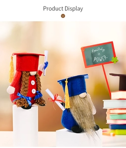 Pair of blue and red graduation gnomes with square hats and scrolls on display stands