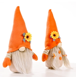Close-up of autumn gnomes featuring sunflowers and plush textures for Thanksgiving decor