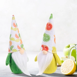 Pair of lime and lemon themed fruit gnomes with citrus pattern hats and white beards