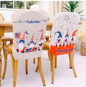 Detail of USA Independence Day chair covers featuring festive gnomes and Welcome text