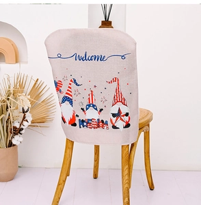 Detail of linen chair cover with patriotic American gnomes and Welcome text for home decor
