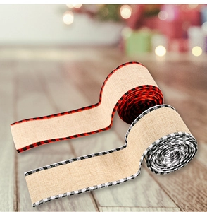 Close-up of rustic jute-like ribbons with classic red and black plaid stitched edges