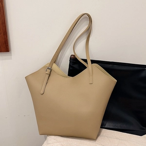 Large beige tote bag with litchi grain leather and wavy edge design for daily use
