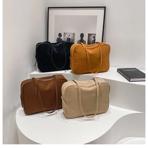 Collection of four vintage tote bags in black, yellow, brown, and beige faux suede finish