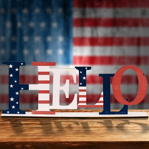 Patriotic wooden HELLO letters with stars and stripes pattern for American home decor