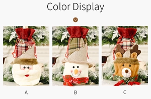 Three Christmas wine bottle covers featuring Santa, Snowman and Reindeer in linen