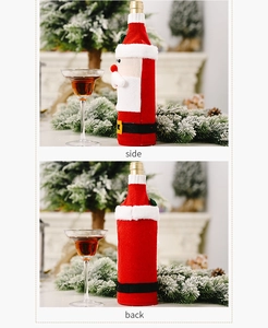 Side and back view of knitted Santa Claus wine bottle cover for Christmas table decor