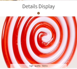 Macro detail of red and white spiral patterns on high-quality fabric Christmas candy charms