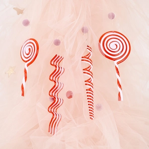 Red and white Christmas candy ornaments set featuring swirls and lollipop shapes