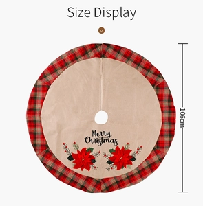 Detail view of 106cm Christmas tree skirt with Merry Christmas text and red poinsettia pattern