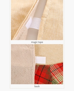Detail view of burlap Christmas tree skirt with magic tape closure and plaid fabric