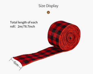 Close-up of 5cm wide red and black buffalo plaid ribbon roll for Christmas decor
