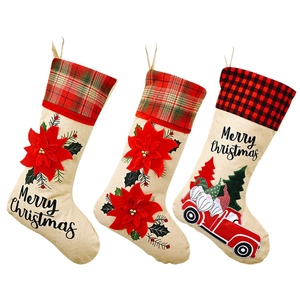 Set of 3 rustic burlap Christmas stockings with red floral and vintage truck designs