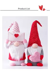 Close-up of plush Valentine's Day gnomes with heart envelope and pink fuzzy heart details