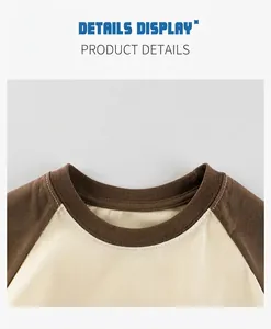 Close-up of raglan sleeve neckline showing high-quality cotton stitching on kids' t-shirt