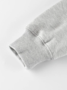 Sweat en polaire gris chiné chaud avec poignets côtelés et texture en maille douce