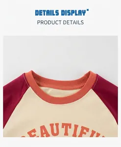 Detail of raglan sleeves and ribbed neckline on kids cotton T-shirt with graphic print