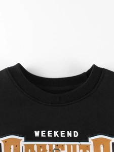 Kids black fleece sweatshirt featuring a white WEEKEND print and ribbed crewneck collar