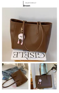Brown large capacity tote bag with pink pompom charm and minimalist PU leather design