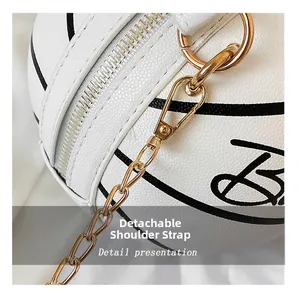 Detail showing the white basketball purse leather texture and gold chain strap