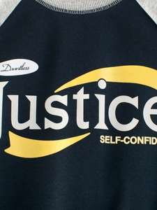 Navy blue raglan sleeve sweatshirt for kids featuring white Justice printed text