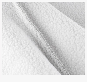 Detail of soft white fleece fabric with premium grey stitched hem on kids sweatshirt
