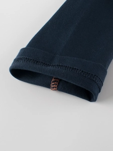 Dark blue boys long sleeve t-shirt sleeve detail with orange contrast stitching