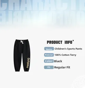 Detail of black cotton kids joggers showing Outgoing print and 100% cotton texture