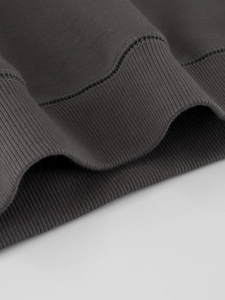Dark gray fleece sweatshirt featuring thick ribbed hem and high-quality cotton texture