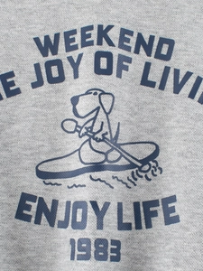 Grey kids sweatshirt featuring a cartoon dog rowing a kayak with Weekend Joy print