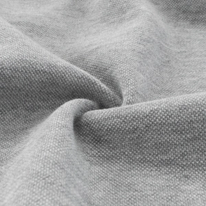 Detailed macro view of the grey pique knit fabric texture on this zip-up hoodie