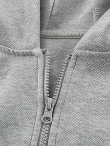 Kids grey zip-up hoodie featuring premium knit fabric texture and durable zipper detail